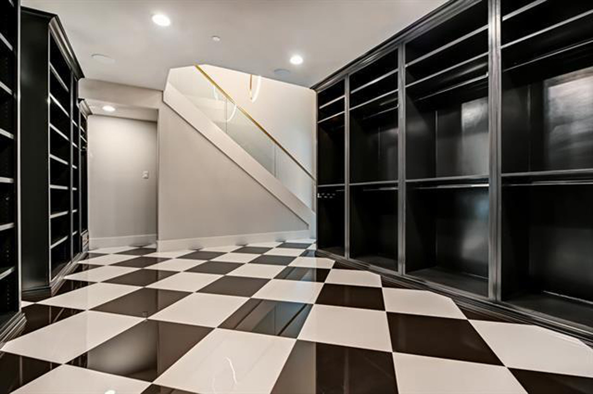 downstairs-closet-black-shelves